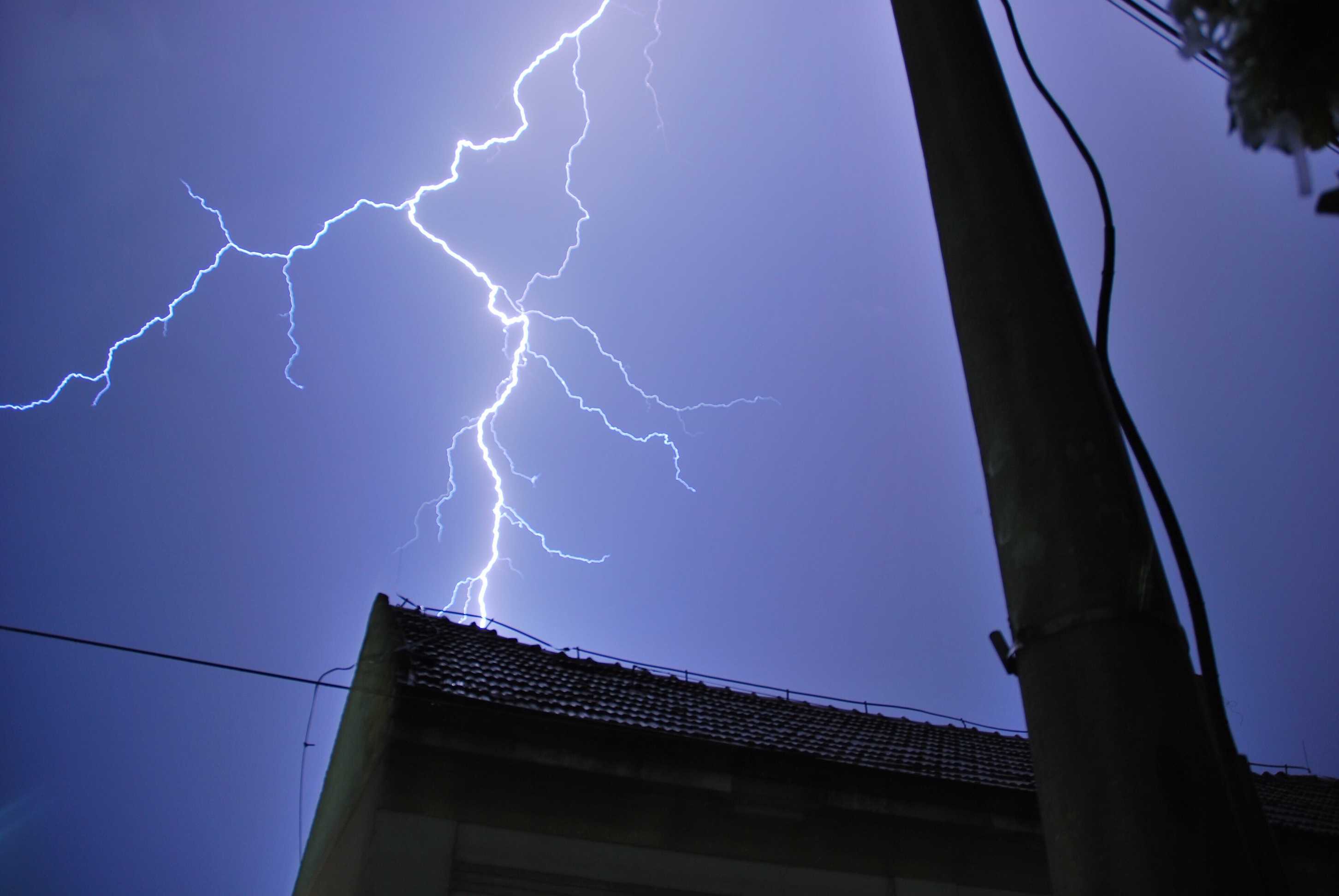 lightning strike on house at night